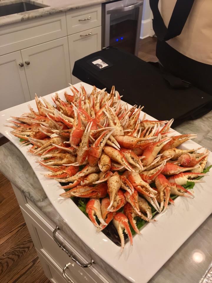 Platter of seasoned crab claws prepared for an event